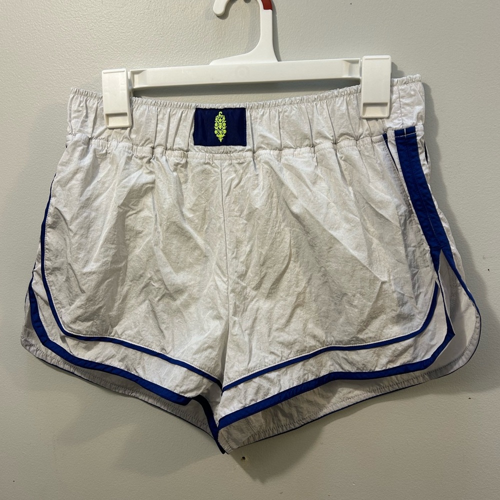Free People White Athletic Pants with Blue Stripe Detail. Size Medium w/lining.